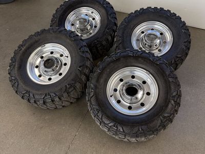 16in OEM 1997 f350 Alcoa wheels/ 305/70/16 nittos