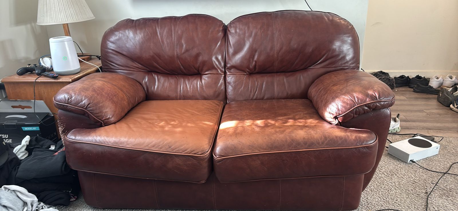 Matching leather love seat and chair