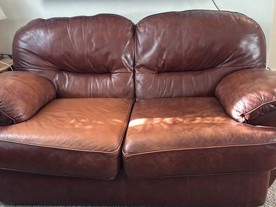 Matching leather love seat and chair