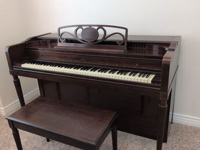 Everett console piano