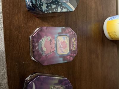 Pokemon sealed tins