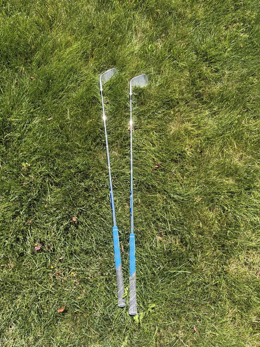 Unbranded Golf Irons - Two Clubs with Blue and Gray Grips