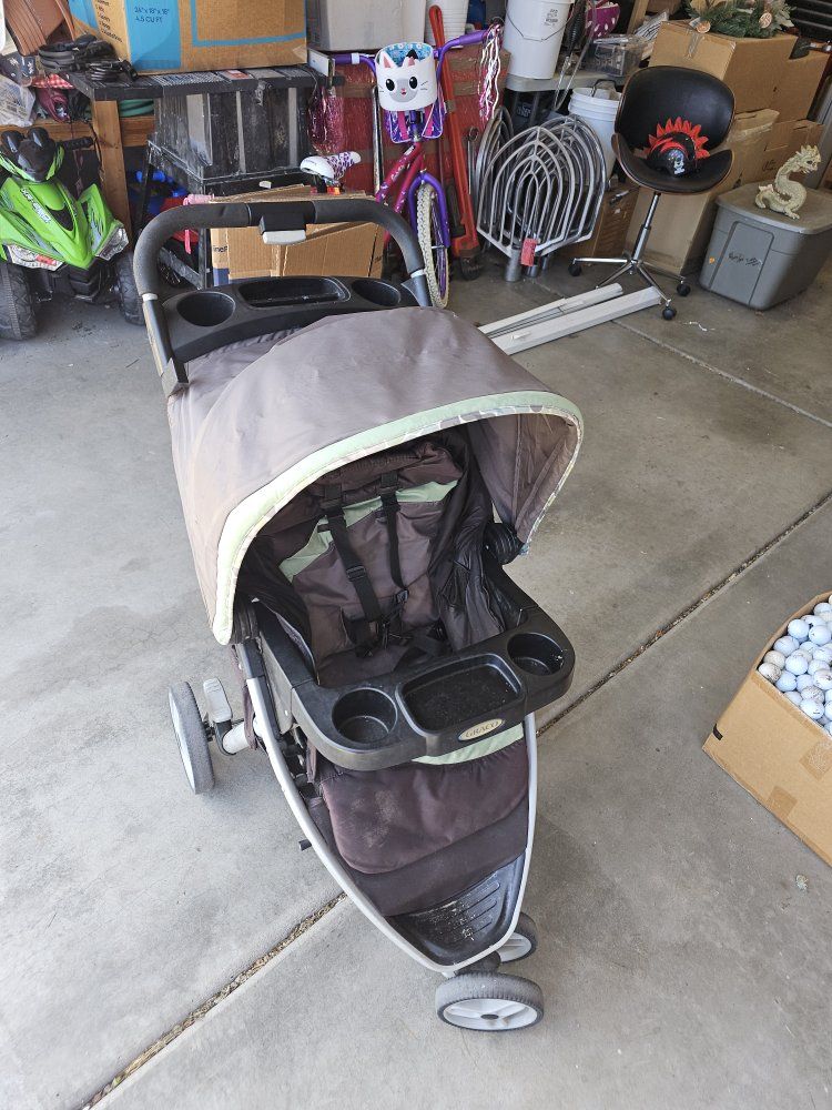 Graco Modes Jogger Stroller - Brown/Green 3-Wheel Design with Parent & Child Trays
