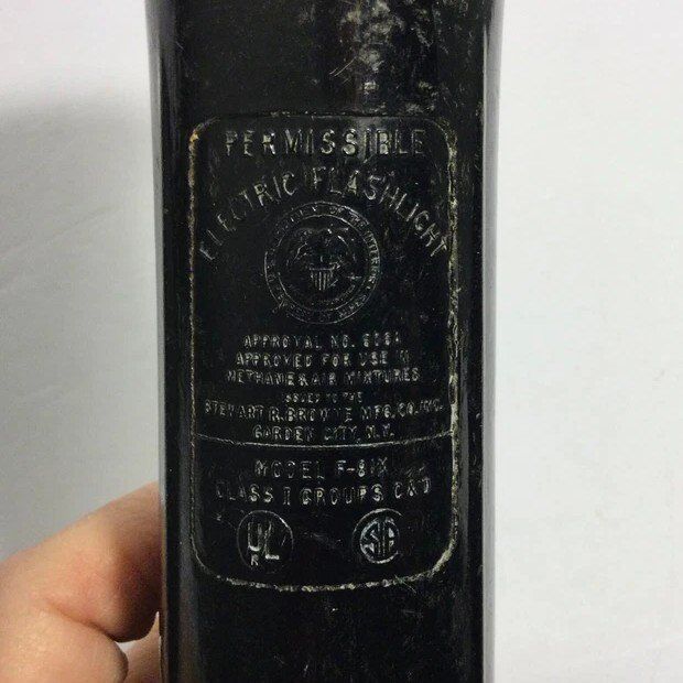 antique electric flashlight