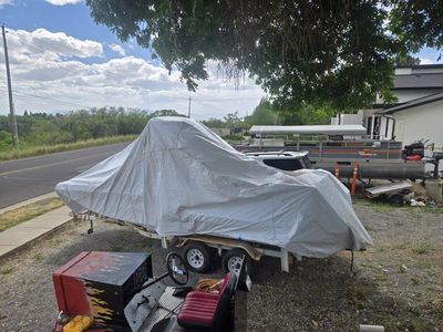 19 ft Tri-Hull Boat with in-board 230 HP mercruiser engine.