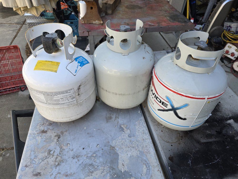3 propane tanks,  20 each