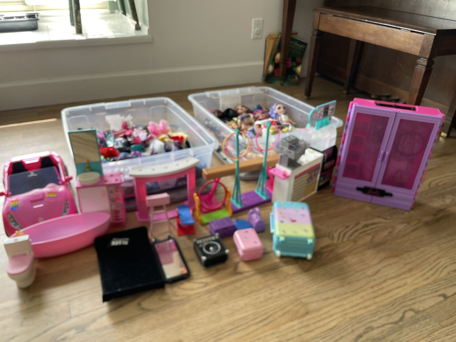 Barbies, other dolls, and tons of accessories