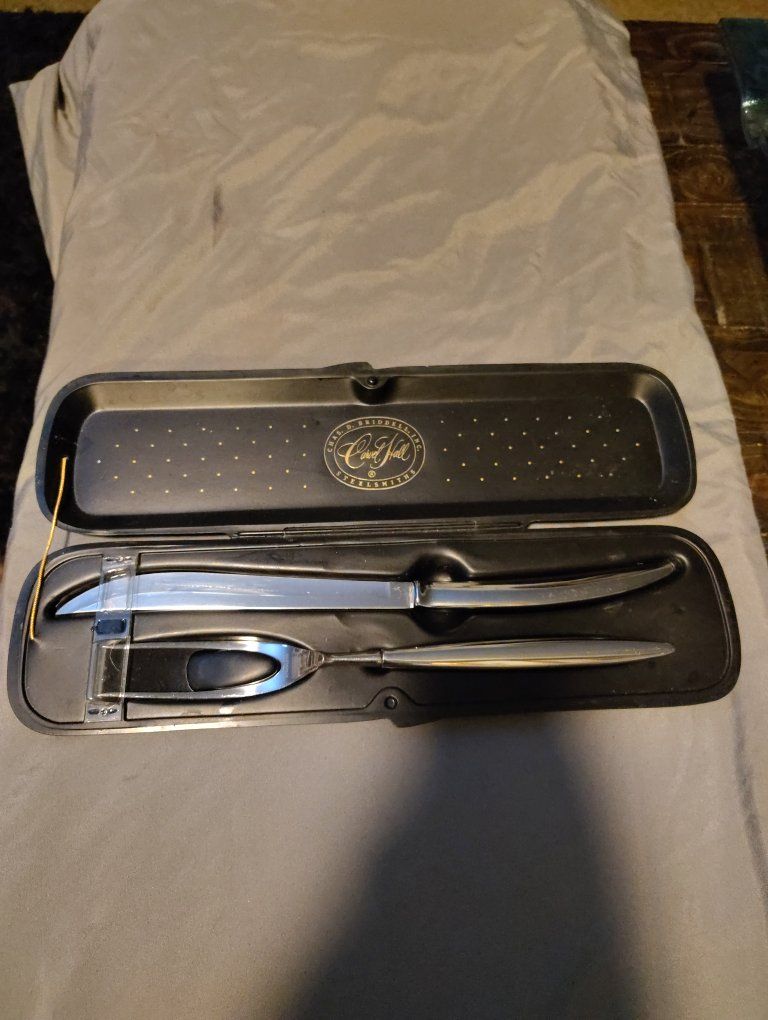 Vintage Chas. D. Briddell Carvel Hall carving knife and fork set.