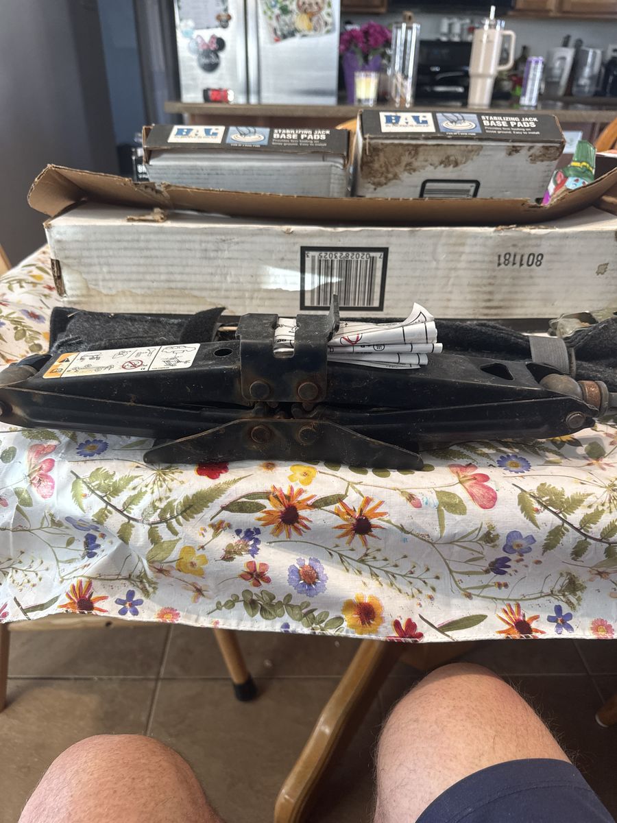 Scissor Jack For A Sport Utility Vehicle