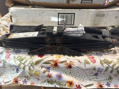 Scissor Jack For A Sport Utility Vehicle