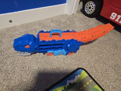 Hot Wheels T-Rex Transport Hauler Toy