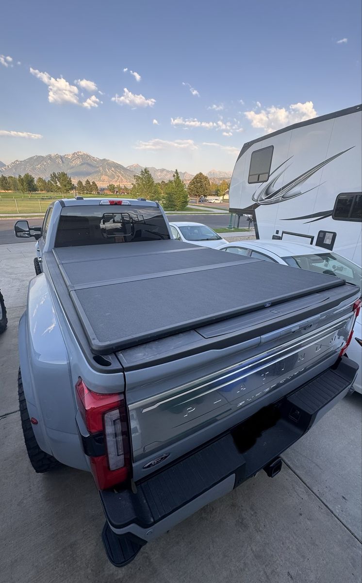 Ford F-Series Super Duty Truck Bed Tonneau Cover Black hard Tri-Fold. Less than a few hundred miles on cover.