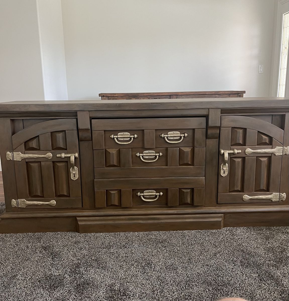 Large Wooden 9-Drawer Dresser with Decorative Hardware