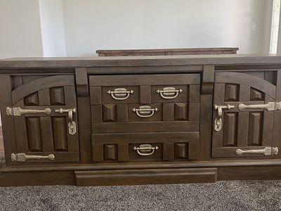 Large Wooden 9-Drawer Dresser with Decorative Hardware