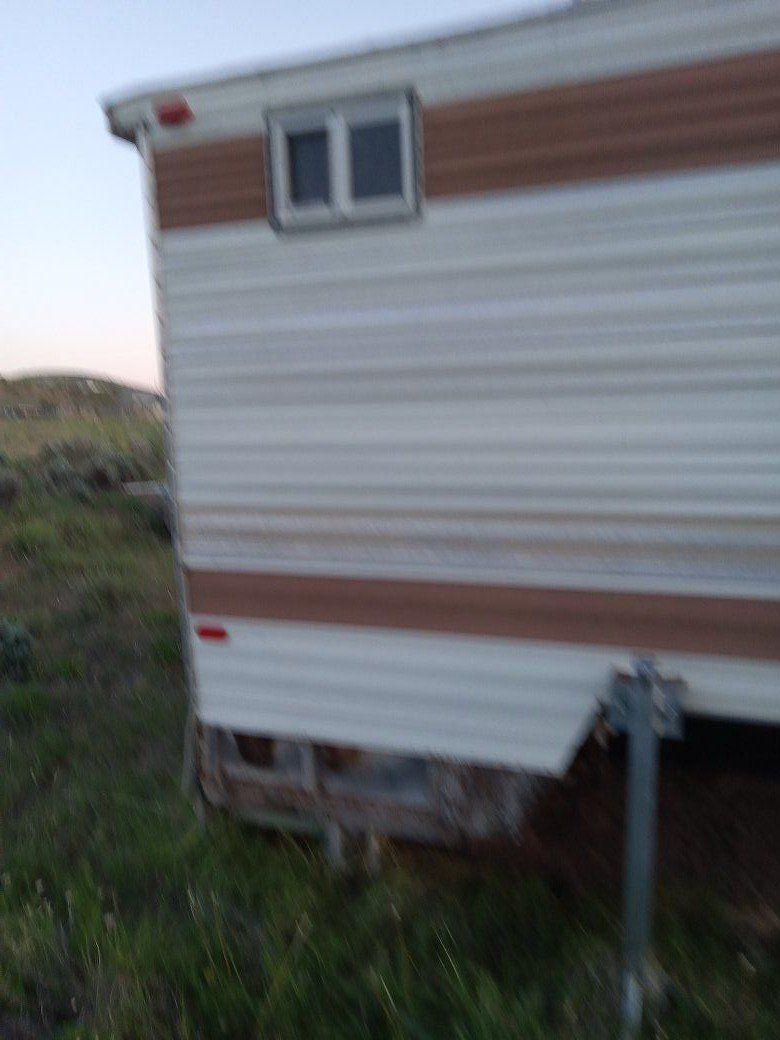 About a 11 foot cab over Camper