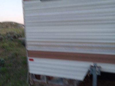 About a 11 foot cab over Camper