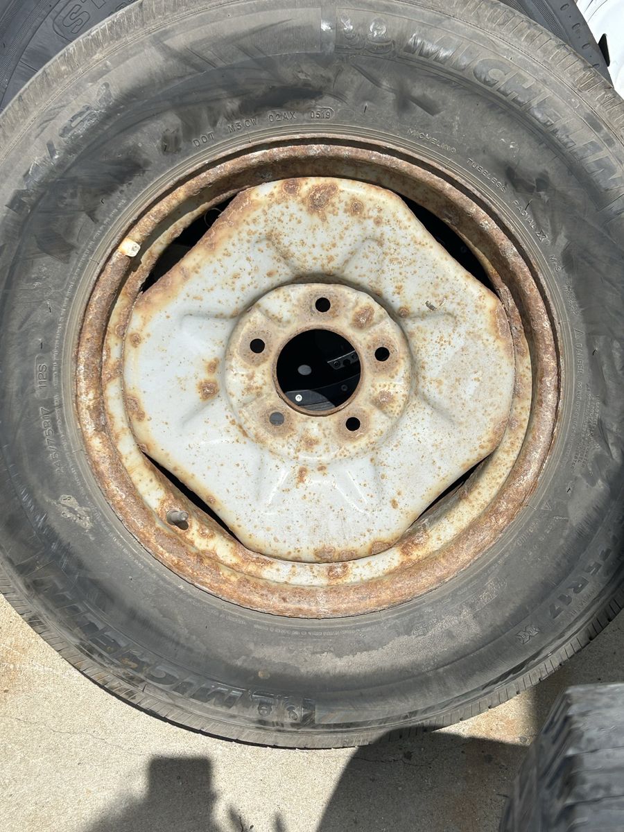 Michelin 245/R17. Used Steel Wheel and Tire with Significant Rust