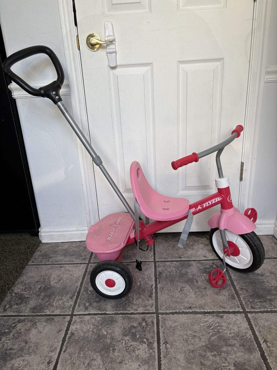 Radio Flyer Pink 4-in-1 Stroll 'N Trike - Toddler Push Tricycle with Parent Handle