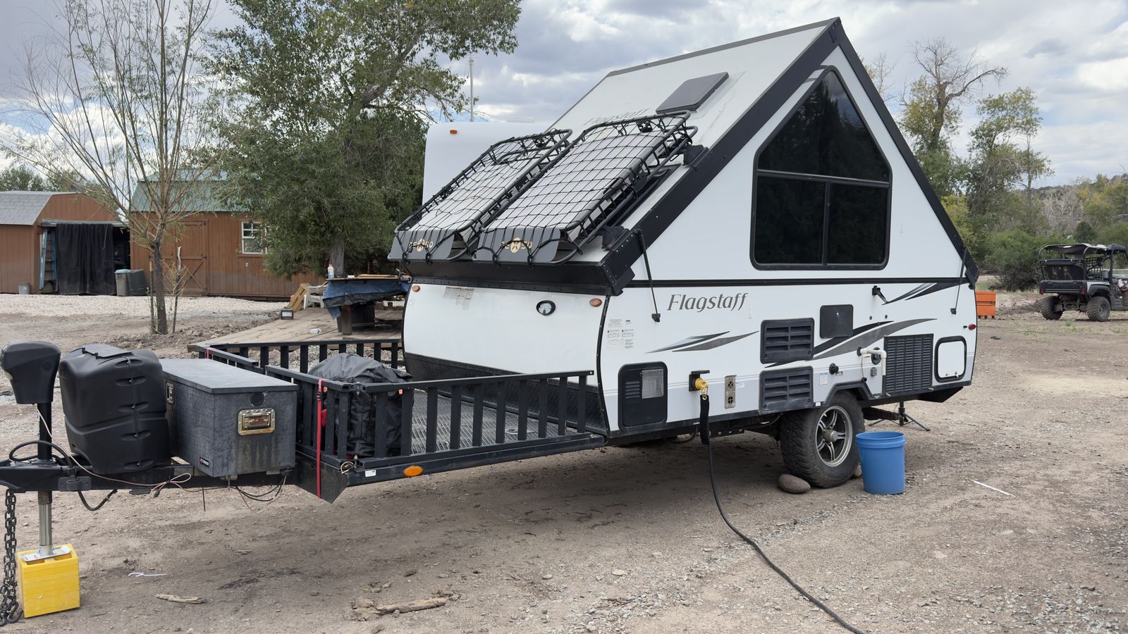 2021 Forest River Flagstaff hard sided pop up toy hauler camper