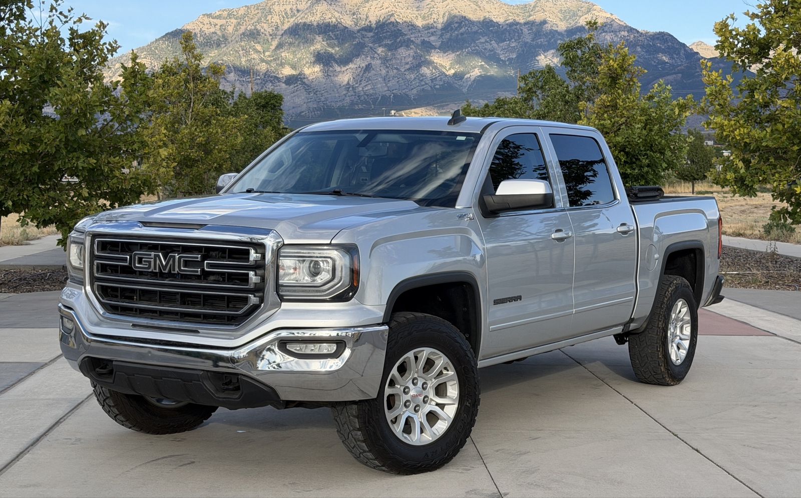 2017 GMC 1500 SLE — rebuilt & branded title, 16% below market