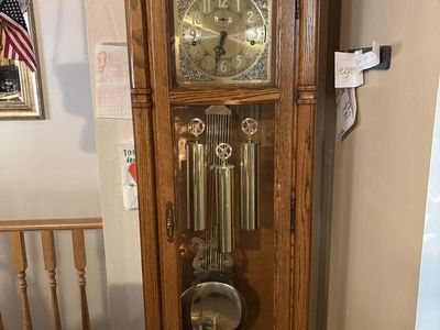 6 1/2 ‘ Howard Miller Traditional Oak Wood Grandfather Clock with Glass Door and Brass Pendulum