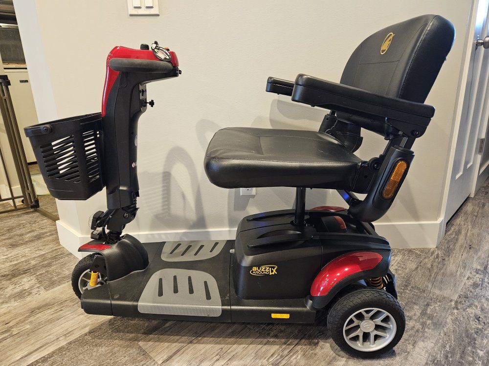 Mobility Scooter - Golden Technologies Buzzaround LX 3 Wheel (Red & Blue), 375lb capacity.