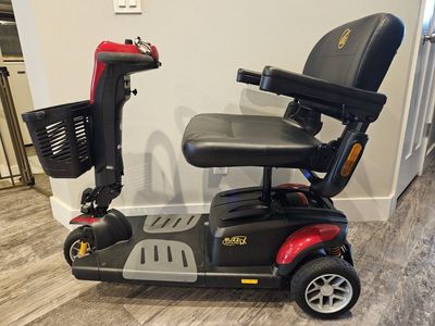 Mobility Scooter - Golden Technologies Buzzaround LX 3 Wheel (Red & Blue), 375lb capacity.
