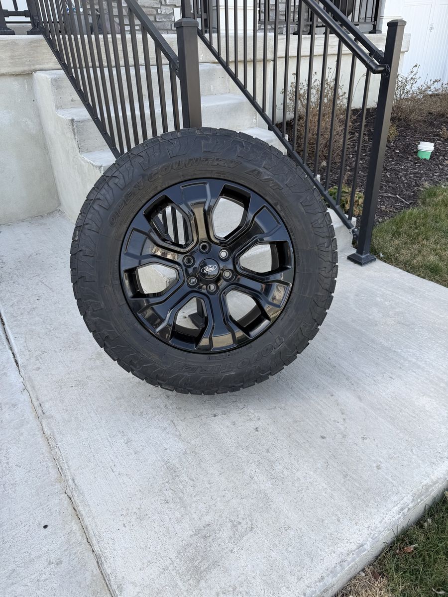 Ford F150 Rims and Tires 275/65R20 Toyo AT3