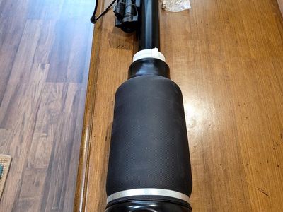 New aftermarket electronic front air suspension strut.