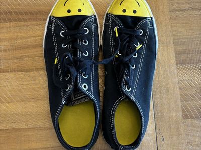 Converse All Star Low Top Black Canvas Shoes with Yellow Smiley Face