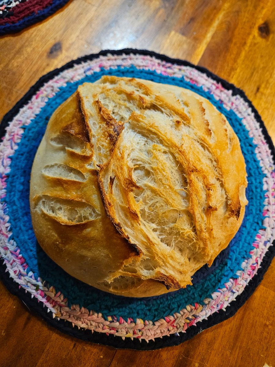 Freshly Baked Homemade Sourdough Bread - Artisanal Round Loaf