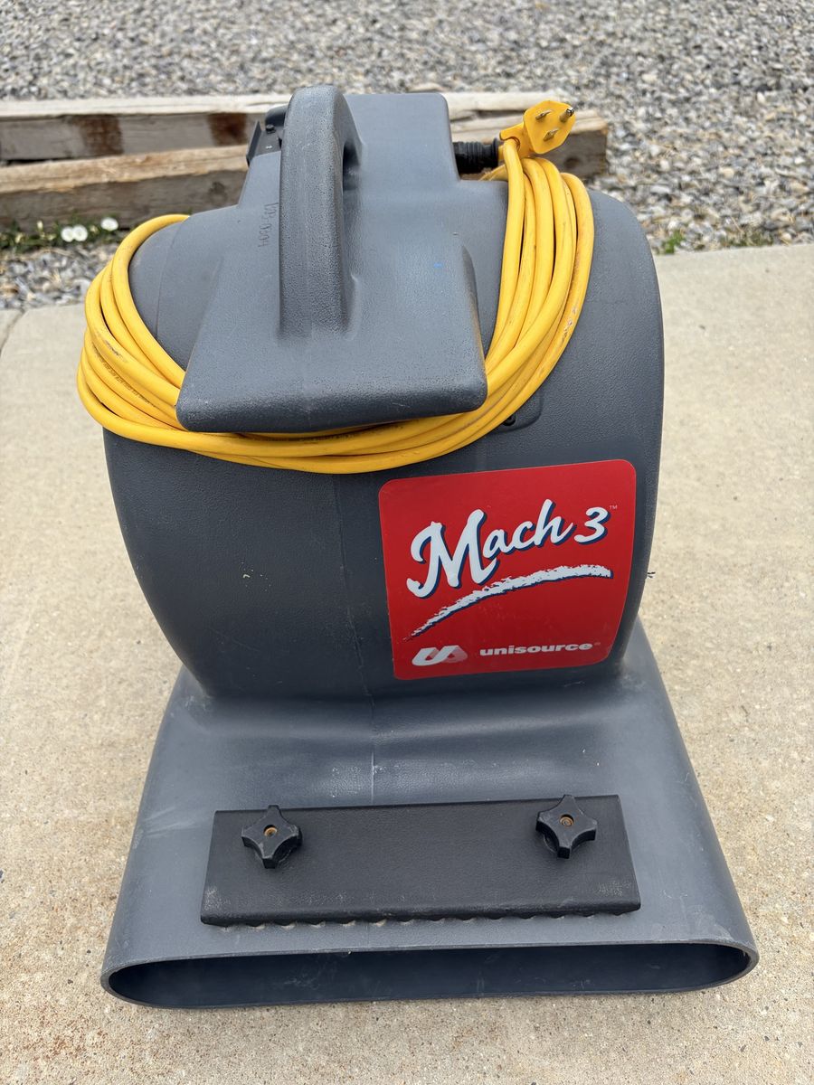 Three Mach 3 carpet dryers/air movers.