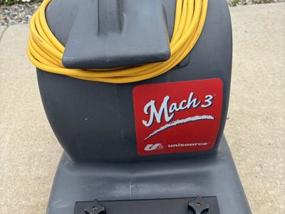 Three Mach 3 carpet dryers/air movers.