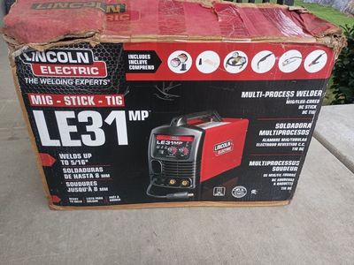 Lincoln LE31MP welder multiprocess. In box