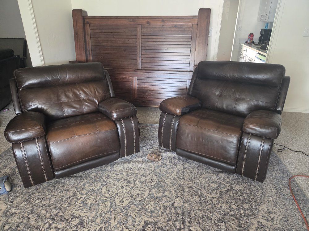 Two Brown electric leather recliners