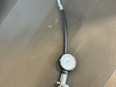 Inflator with pressure gauge for air compressor