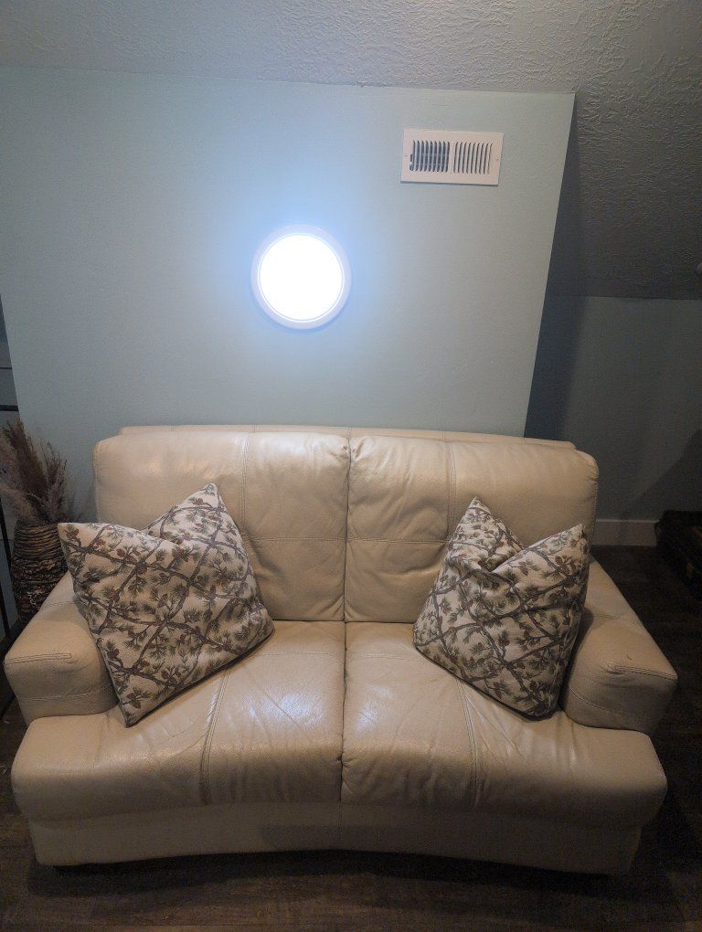 Cream Leather Loveseat Sofa - Compact 2-Seater, Good Condition