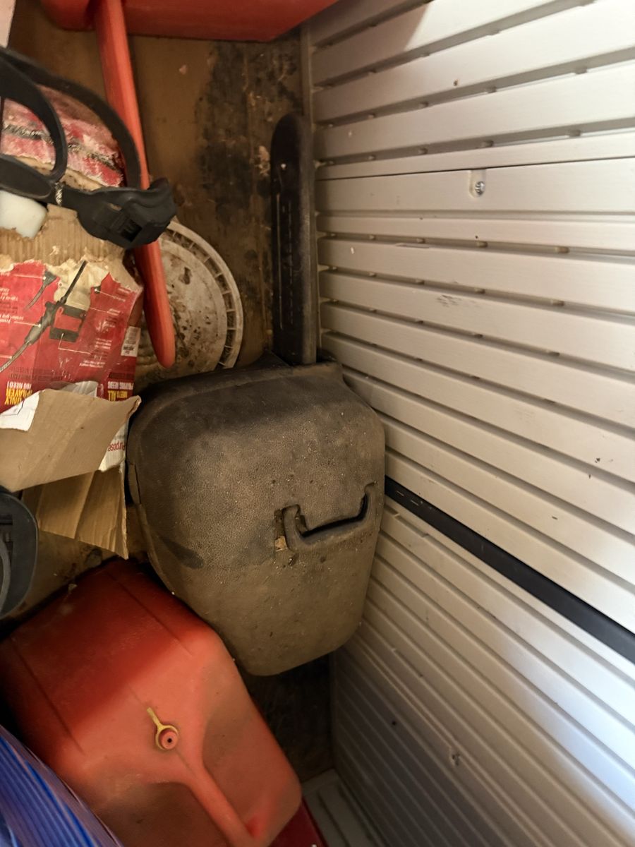 Gas weed eater, gas lawn mower, and old craftsman chain saw.