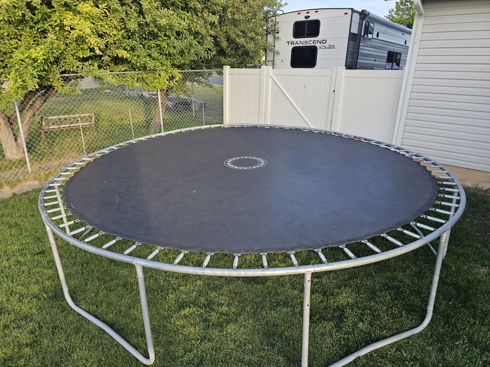 Round Outdoor Trampoline with Frame - Fun for All Ages!