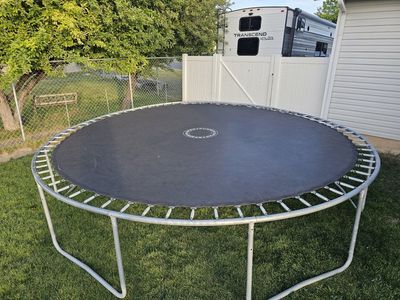 Round Outdoor Trampoline with Frame - Fun for All Ages!