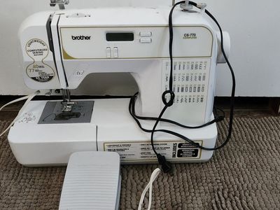 Brother CS770 computerized sewing machine with LCD display and built-in stitches
