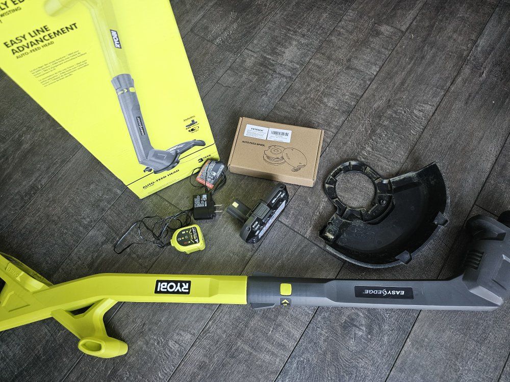 Ryobi One+ 18V 10 Inch Cordless String Trimmer and Edger Kit with Charger and Extra Spools