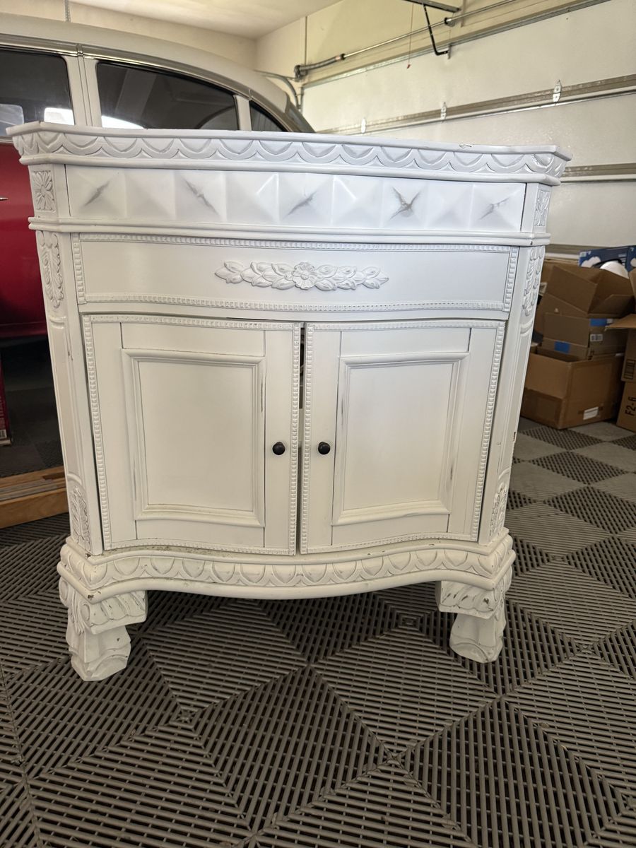 Ornate White Bathroom Vanity Cabinet with Carved Details and Double Doors