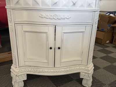 Ornate White Bathroom Vanity Cabinet with Carved Details and Double Doors