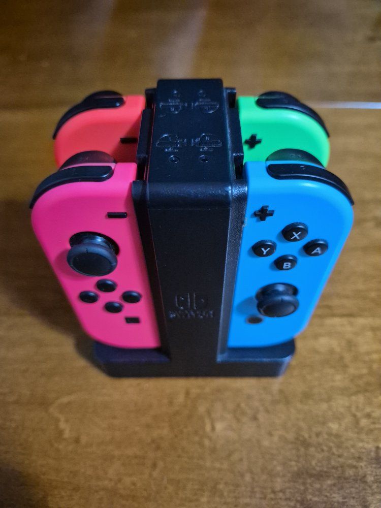 Nintendo Switch Joy-Con Controllers: Neon Red, Blue, green, pink Left Right 2 Pair with Charger included. Excellent Conditions!