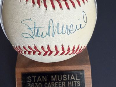 Stan Musial autographed baseball with 20 baseball cards