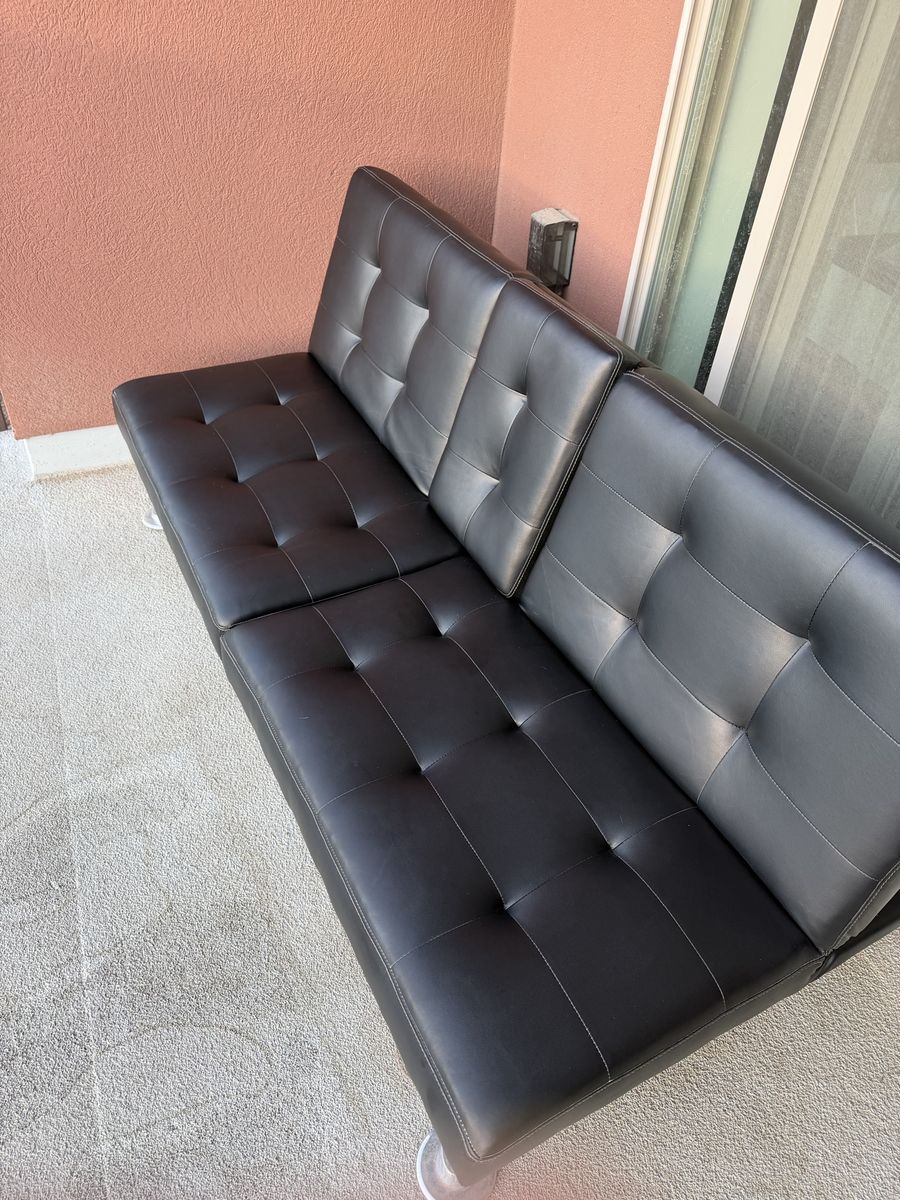 Convertible Black Faux Leather Futon Sofa Bed with Cupholders
