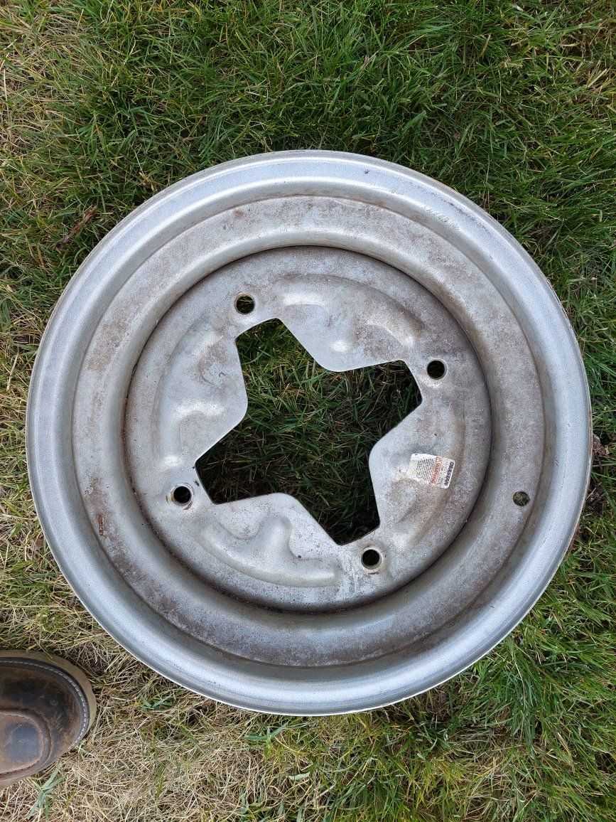 Dexter 15x6 4 lug cross trailer wheel