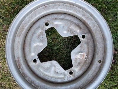 Dexter 15x6 4 lug cross trailer wheel