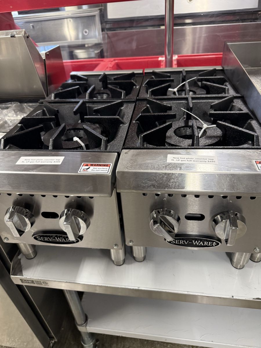 New 2 burner hot plate natural or propane gas , one year manufacture warranty